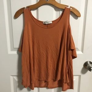 A mustard yellow shirt